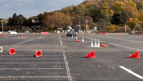 The Audi RS e-tron GT is test-driven in a parking lot at Seoul Grand Park in Gwacheon, Gyeonggi Province, Thursday. (Jo He-rim/The Korea Herald)