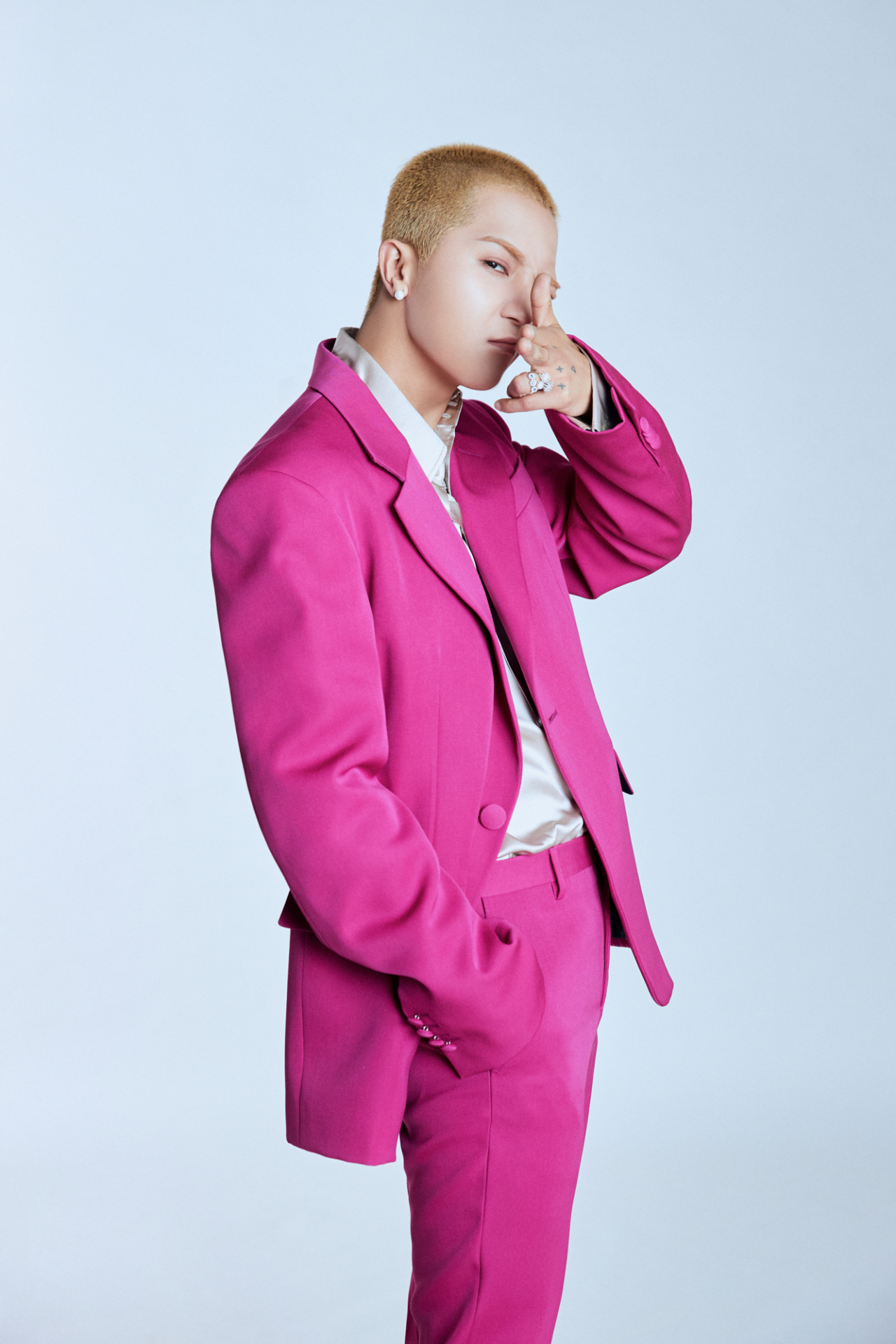 Mino poses during an online press conference Wednesday. (YG Entertainment)