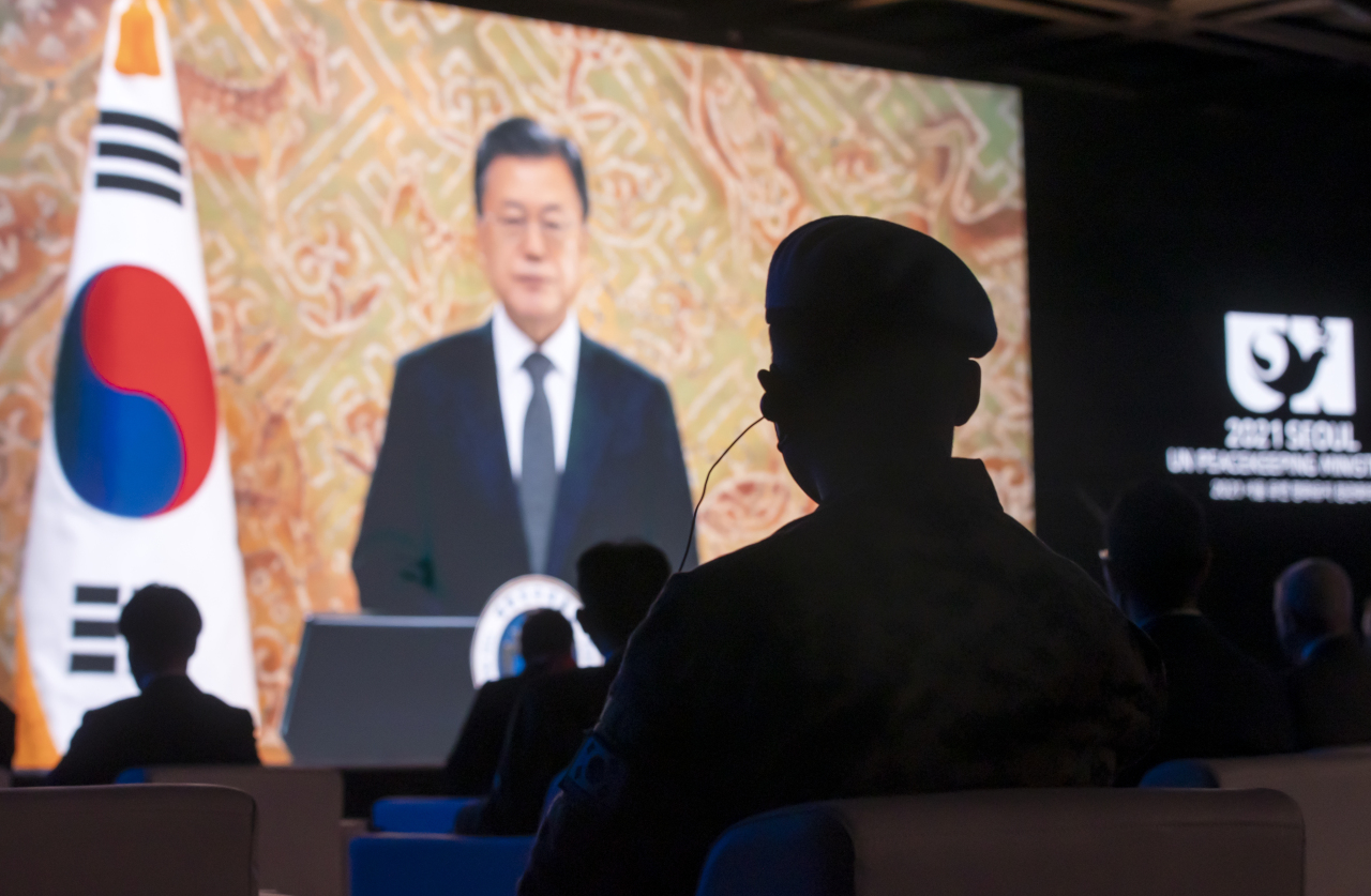 President Moon Jae-in speaks in a congratulatory video speech at the 2021 Seoul UN Peacekeeping Ministerial in Seoul on Tuesday night. (Yonhap)