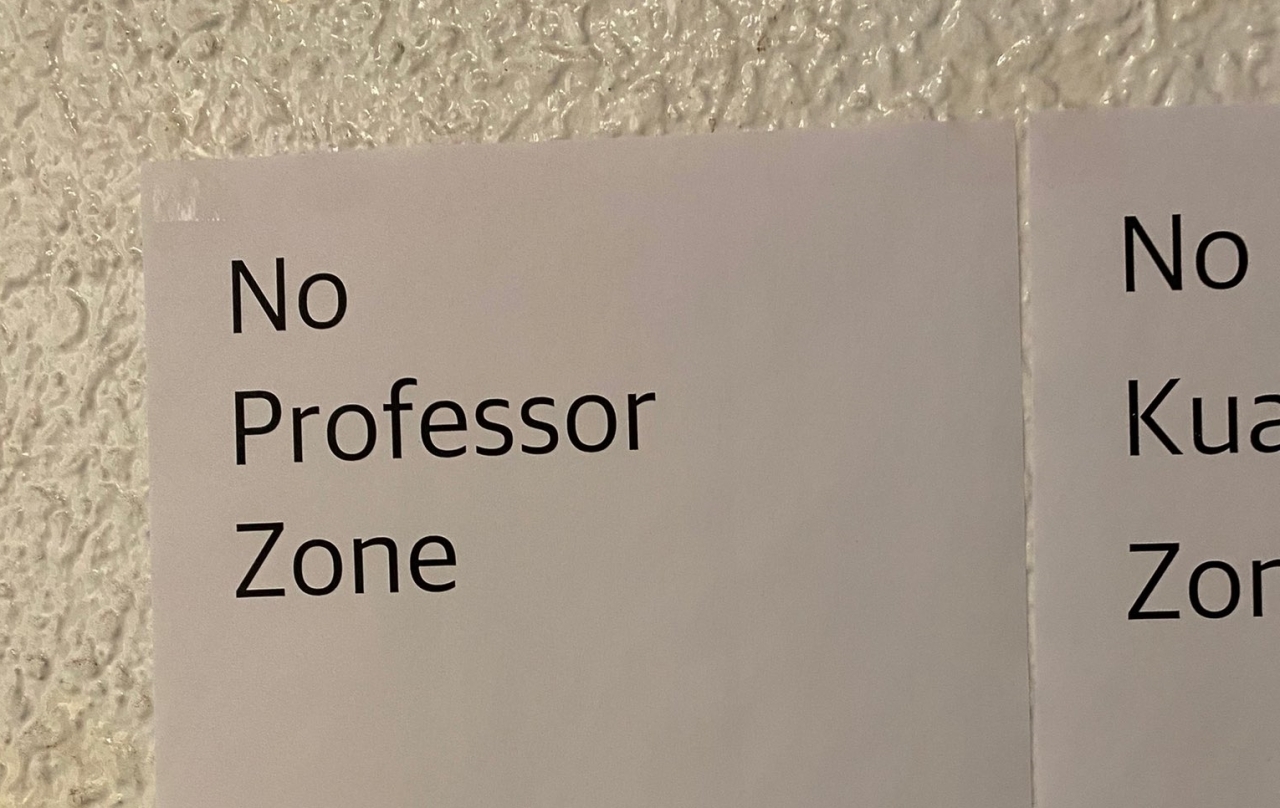 A poster at a bar in Busan explains its “No Professor Zone” policy. (Twitter)