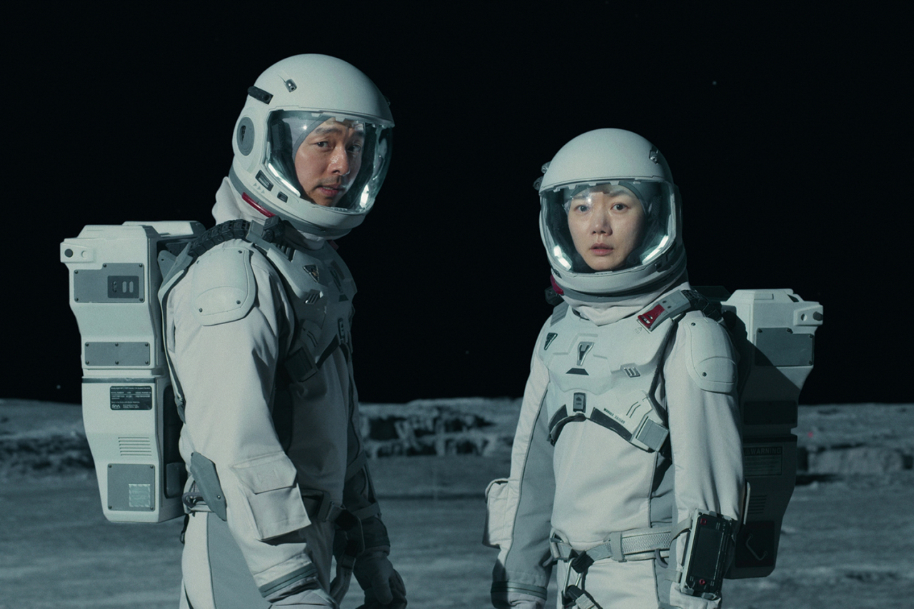 Gong Yoo and Bae Doo-na head to the moon for a classified mission in “The Silent Sea.” (Netflix)