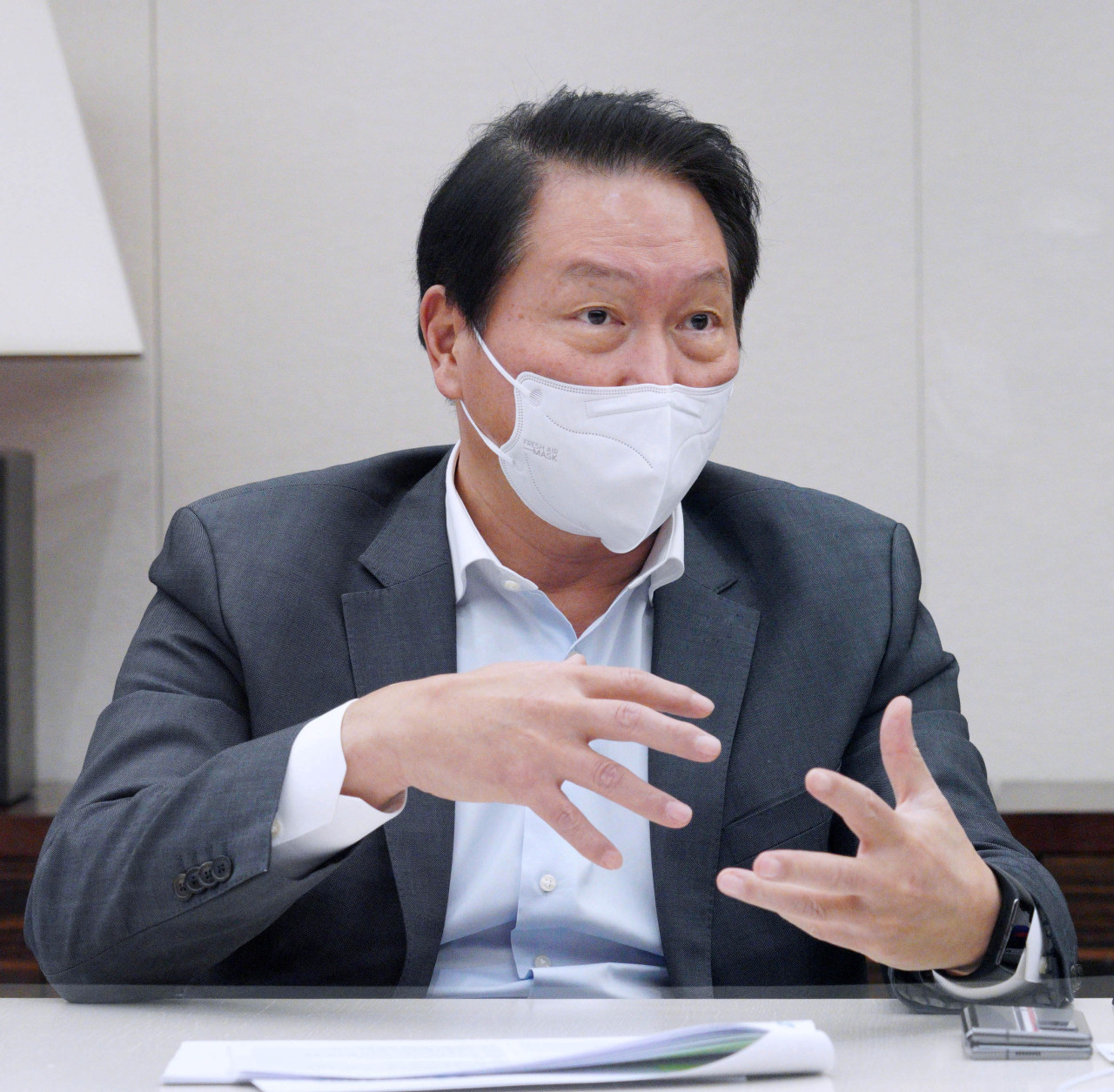 SK Group Chairman Chey Tae-won, who doubles as head of the Korea Chamber of Commerce and Industry, speaks with reporters at a press conference on Wednesday. (KCCI)