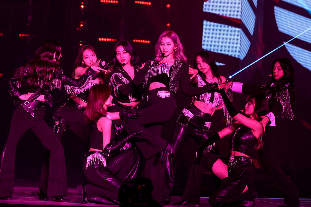 Girl group Twice performs during “Twice 4th World Tour ‘Ⅲ’” on Sunday. (JYP Entertainment)