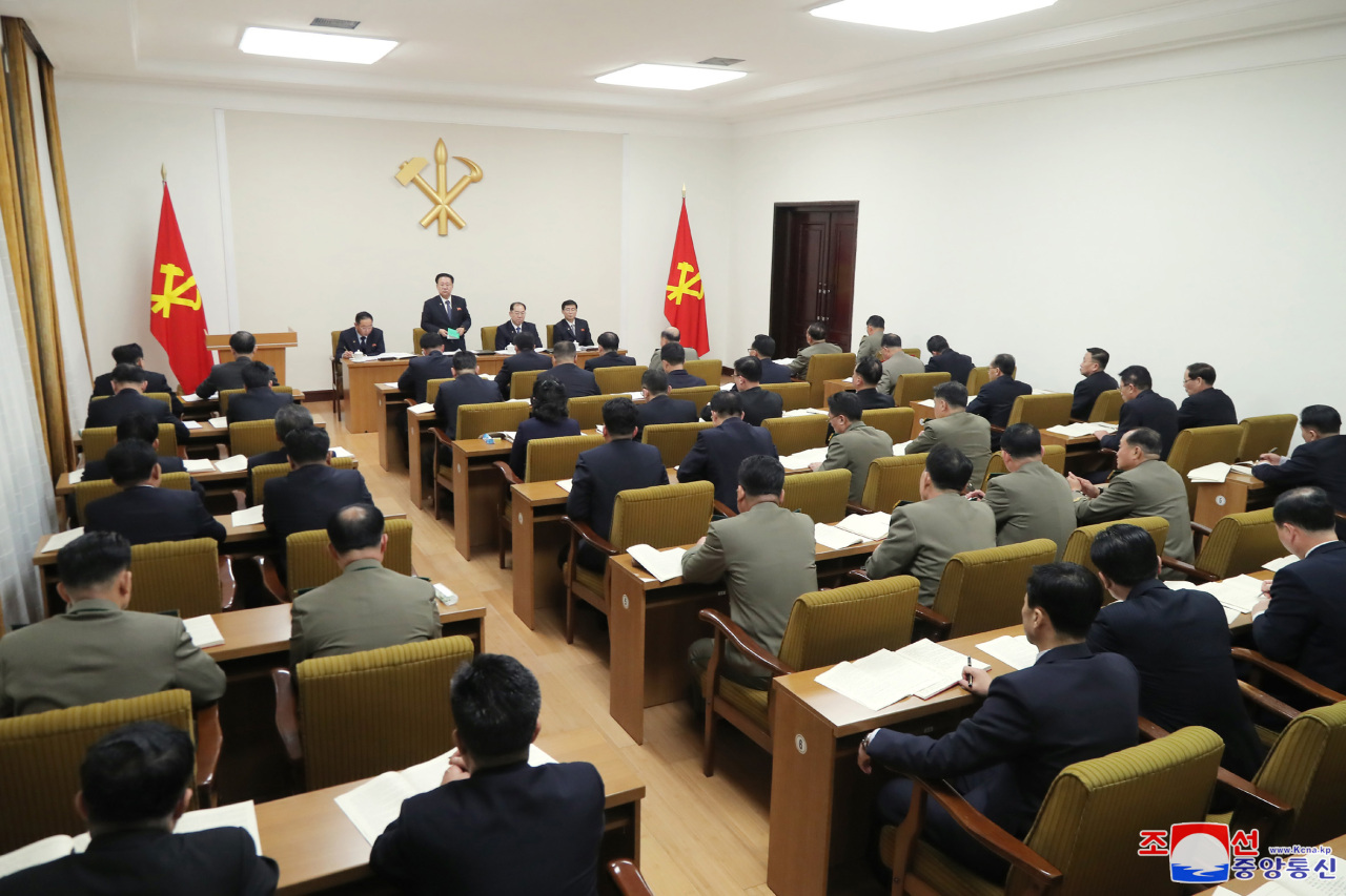 Kim Yong-chol, head of North Korea's United Front Department, presides over a discussion session during a party plenary on Wednesday, in this photo released by the North's official Korean Central News Agency (KCNA) the next day. Next to him is the North's Foreign Minister Ri Son-gwon. (KCNA)