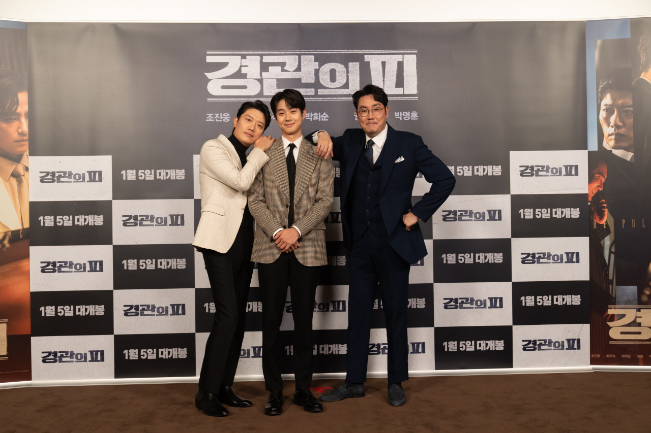 From left: Actors Park Hee-soon, Choi Woo-shik and Cho Jin-woong attend the press conference for “The Policeman‘s Lineage” at CGV Yongsan in Seoul, Wednesday. (Acemaker Movieworks)