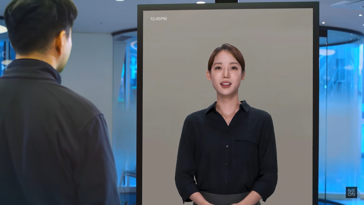 Samsung Electronics’ AI human avatar Neon, unveiled virtually at CES 2021, assists a customer at Shinhan Bank in South Korea. (Samsung Electronics)