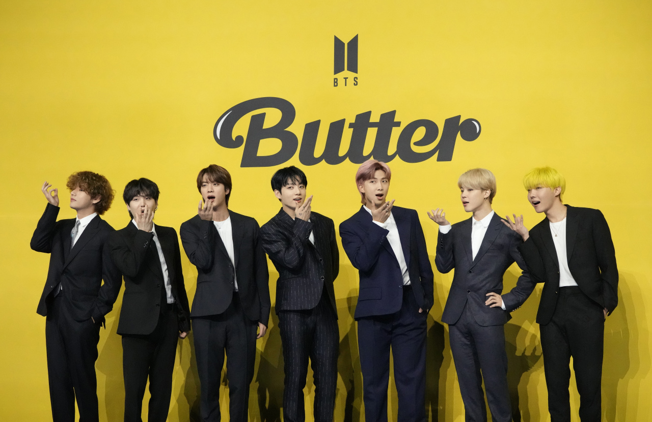 K-pop band BTS poses for photos ahead of a press conference for the release of their single “Butter” in Seoul last May. (AP-Yonhap)