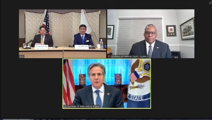 US Secretary of State Antony Blinken (bottom) speaks at the start of the two-plus-two U.S.-Japan Security Consultative Committee meeting, held virtually on Thursday, involving US Secretary of Defense Lloyd Austin (top, R) and their Japanese counterparts, in the image captured from the website of the State Department. (State Department website screenshot)