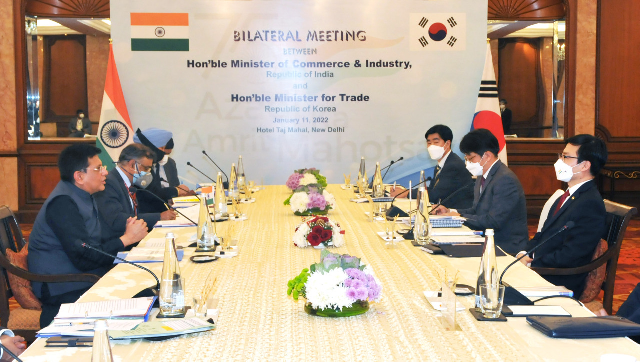 This photo provided by South Korea's Ministry of Trade, Industry and Energy on Wednesday, shows Seoul's Trade Minister Yeo Han-koo (R) and India's Commerce and Industry Minister Piyush Goyal (L) holding a meeting in New Delhi the previous day. (South Korea's Ministry of Trade, Industry and Energy)