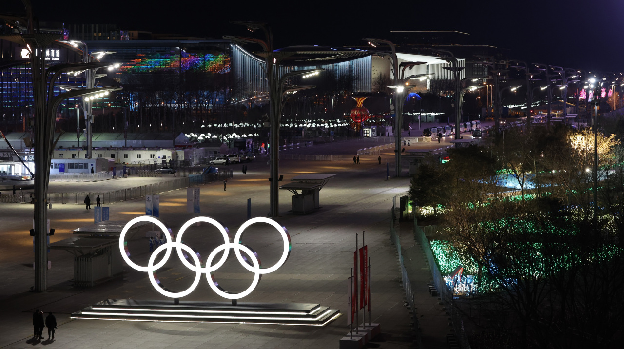 This photo taken on Thursday, shows the Olympic Rings outside the National Stadium in Beijing, the site of the opening ceremony for the Beijing Winter Olympics. (Yonhap)
