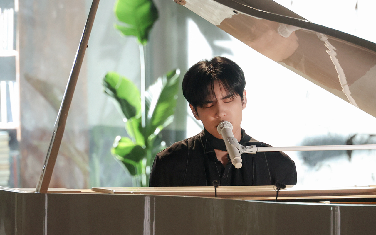 Wonpil of boy band Day6 performs during an online press conference Monday. (JYP Entertainment)
