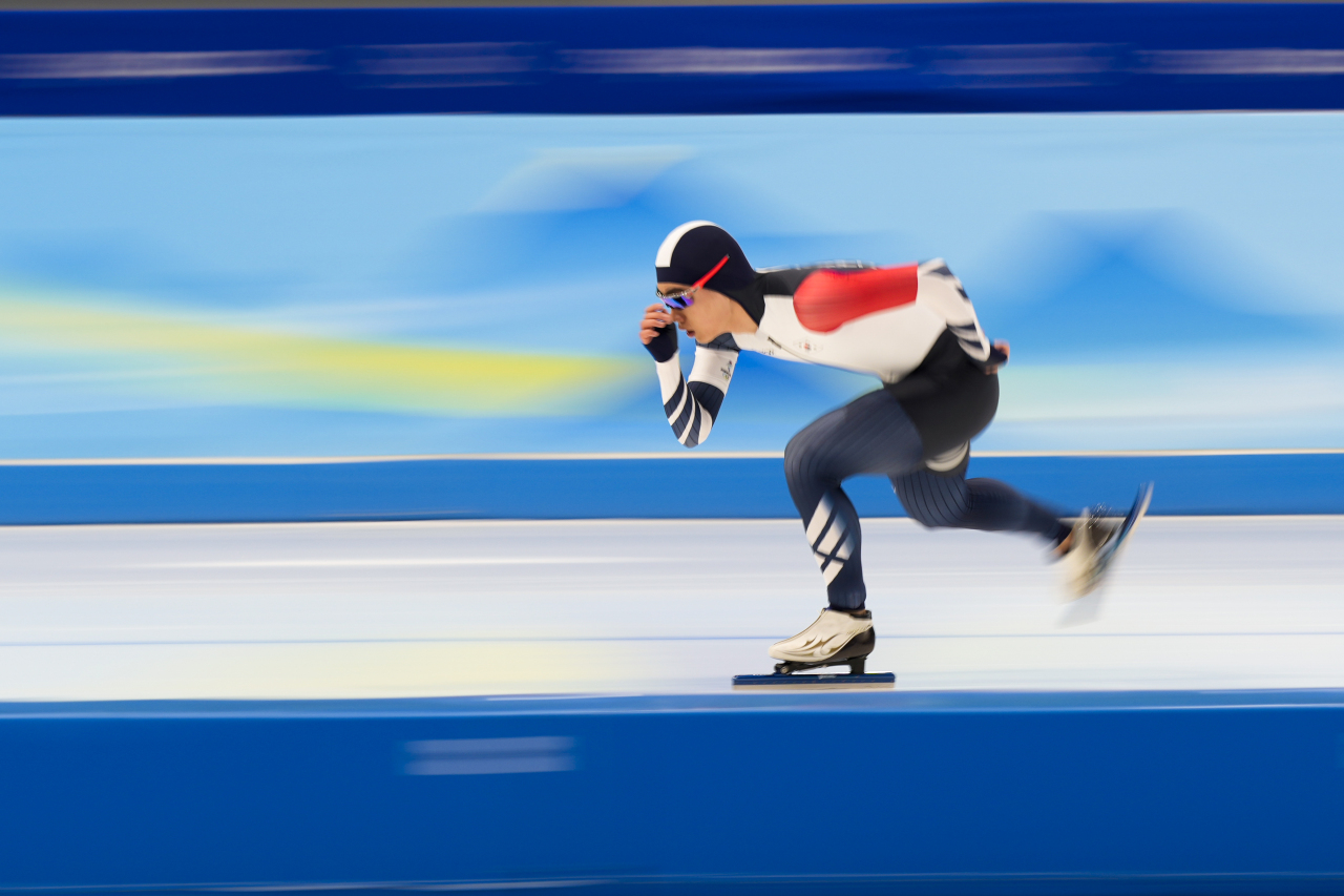 Kim Min-seok of South Korea skates to a bronze medal in the Men‘s 1500m Speed Skating event at the Beijing 2022 Winter Olympics on Monday. (UPI)