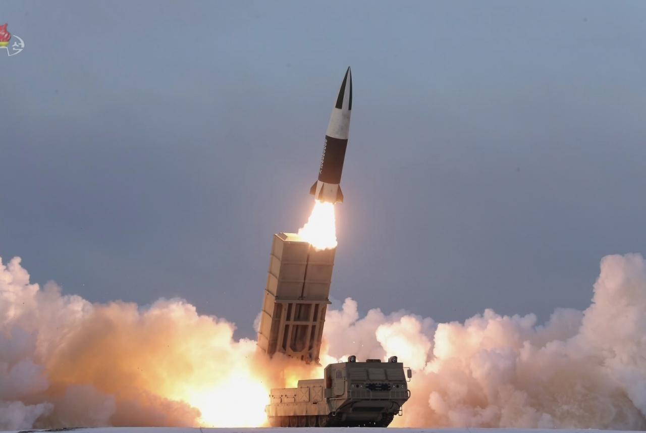 This photo, released by North Korea's official Korean Central News Agency (KCNA) on Oct. 20, 2021, shows a submarine-launched ballistic missile (SLBM) being fired in waters off the east coast the previous day. (KCNA)