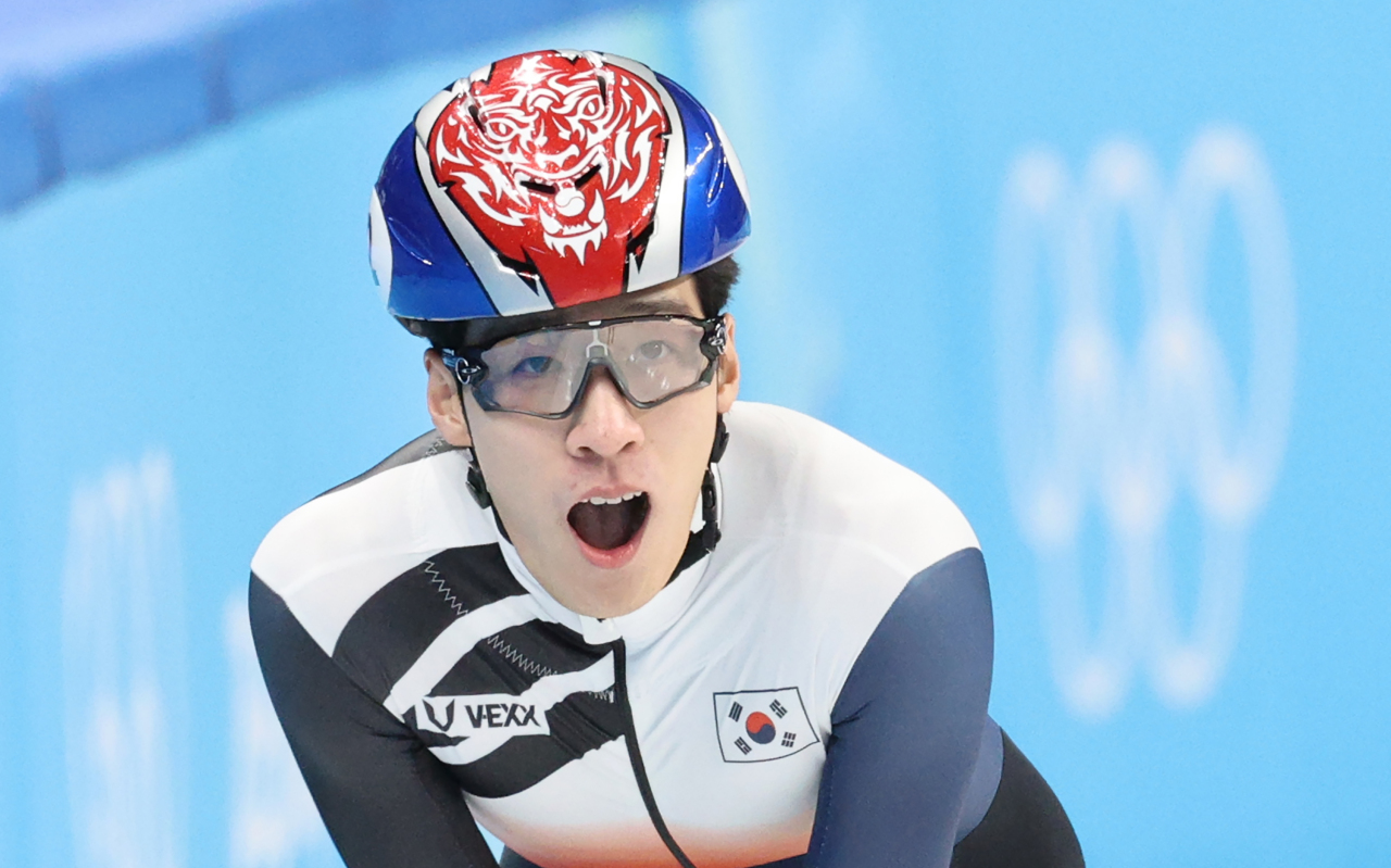 Hwang Dae-heon of South Korea reacts after finishing his race in the men's 500m heats in short track speed skating at the Beijing Winter Olympics at Capital Indoor Stadium in Beijing on Friday. (Yonhap)