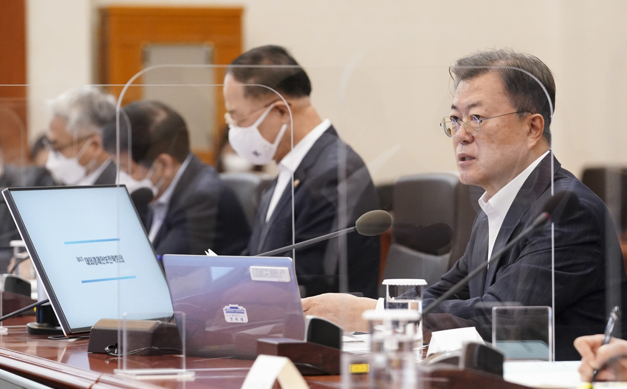 President Moon Jae-in presides over a foreign economic security strategy meeting on Monday. (Yonhap)