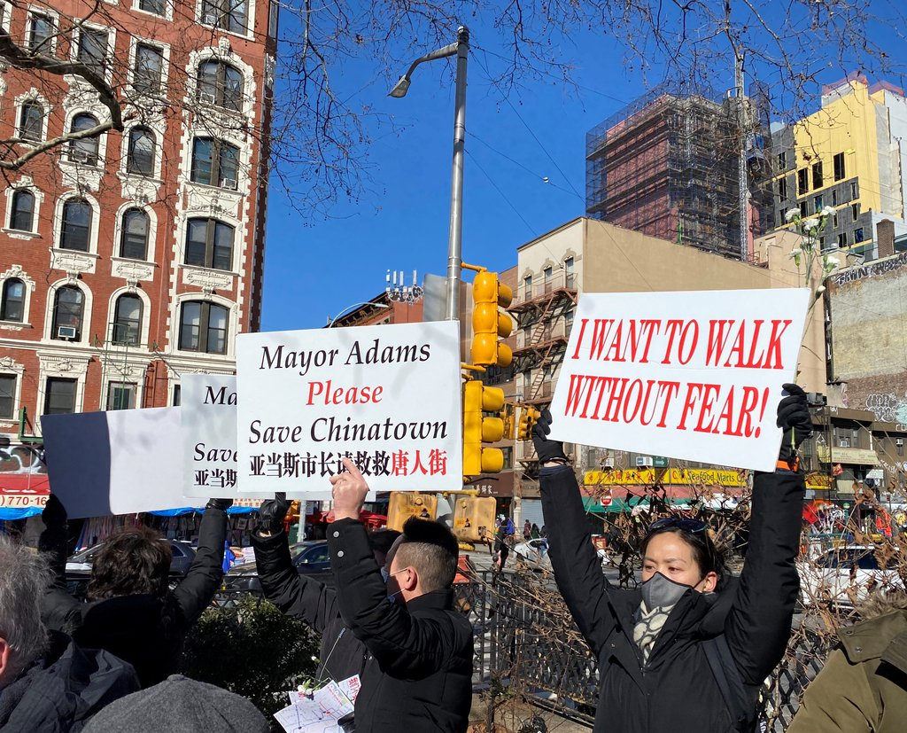 Protesters hold pickets to urge New York City to take actions against rising anti-Asian crime during a rally in Manhattan on Tuesday. (Yonhap)