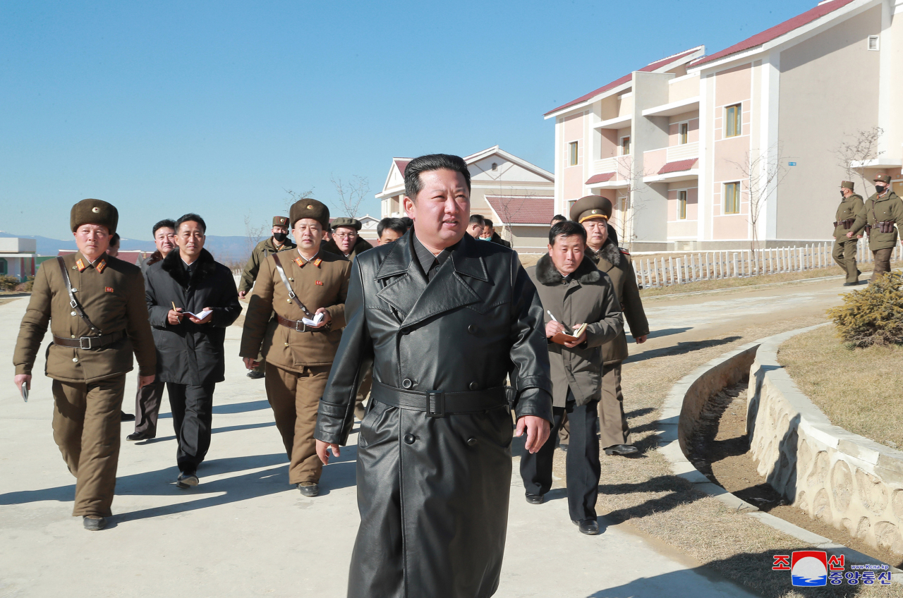 North Korean leader Kim Jong-un (C) visits the northwestern city of Samjiyon, near the border with China, where a major development project is underway, in this photo released on Nov. 16, 2021. (North's official Korean Central News Agency)