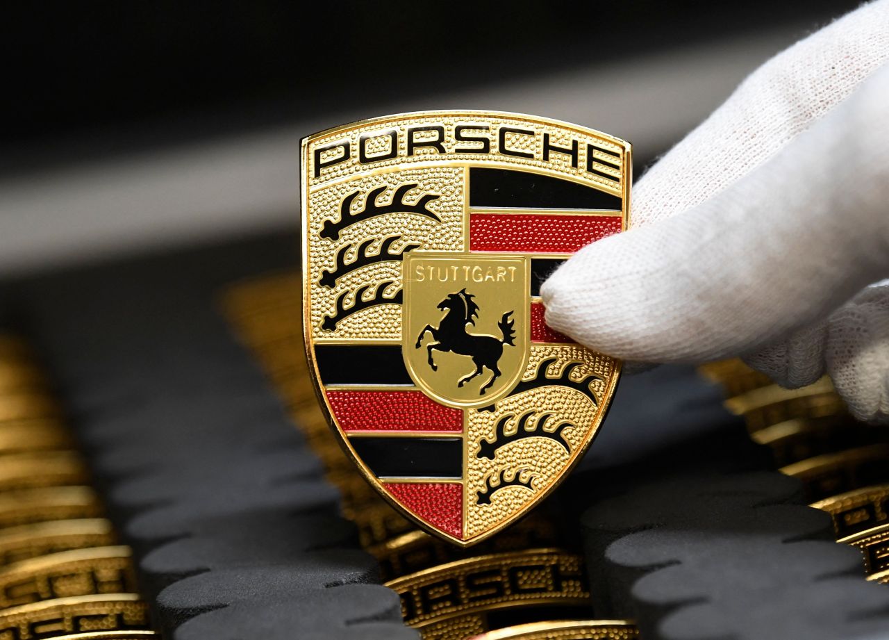 This file photo taken on March 4, 2020 shows the logo of German luxury car maker Porsche AG at the company's production site in Stuttgart, southwestern Germany. (AFP)
