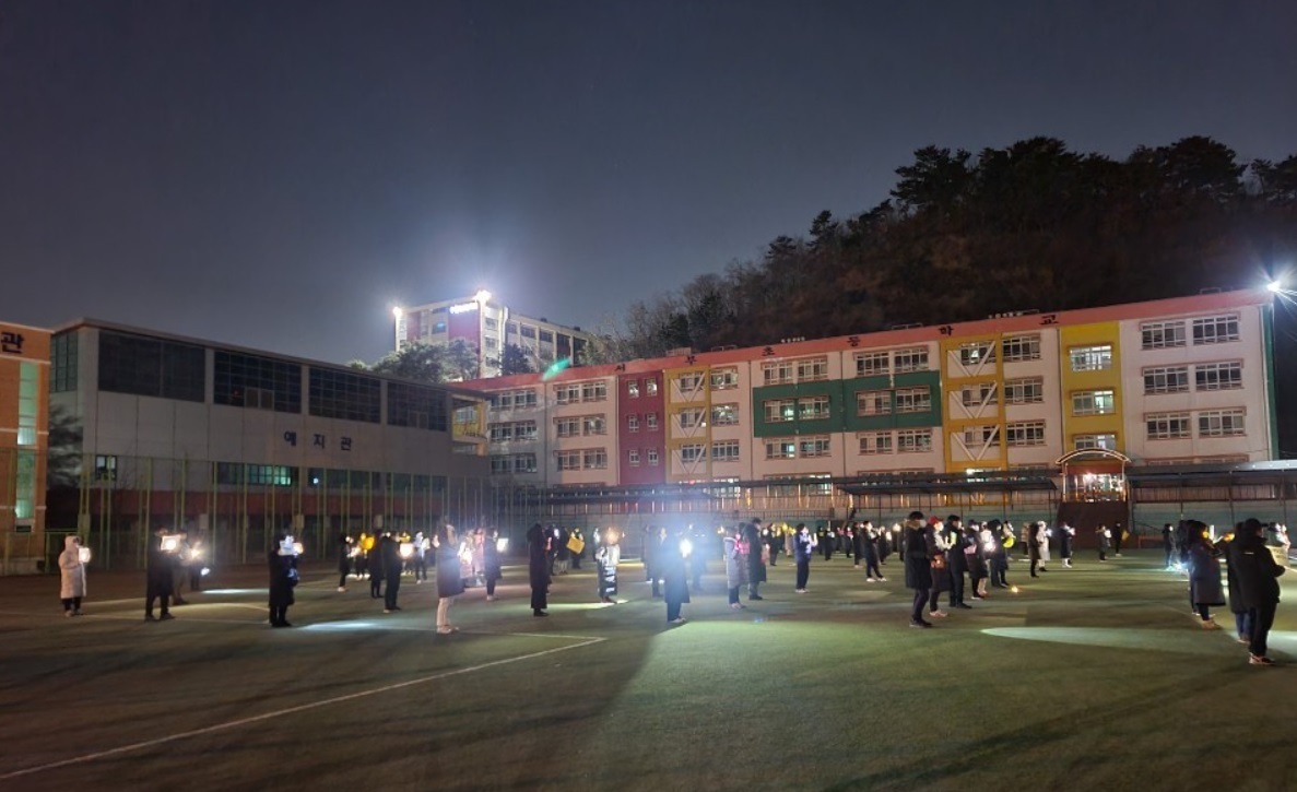 Nearly 50 parents of children attending Seoboo Elementary School in Dong-gu, Ulsan, hold a protest against the city’s education office to nullify the admission of the Afghan children into the school. (Courtesy of Park)