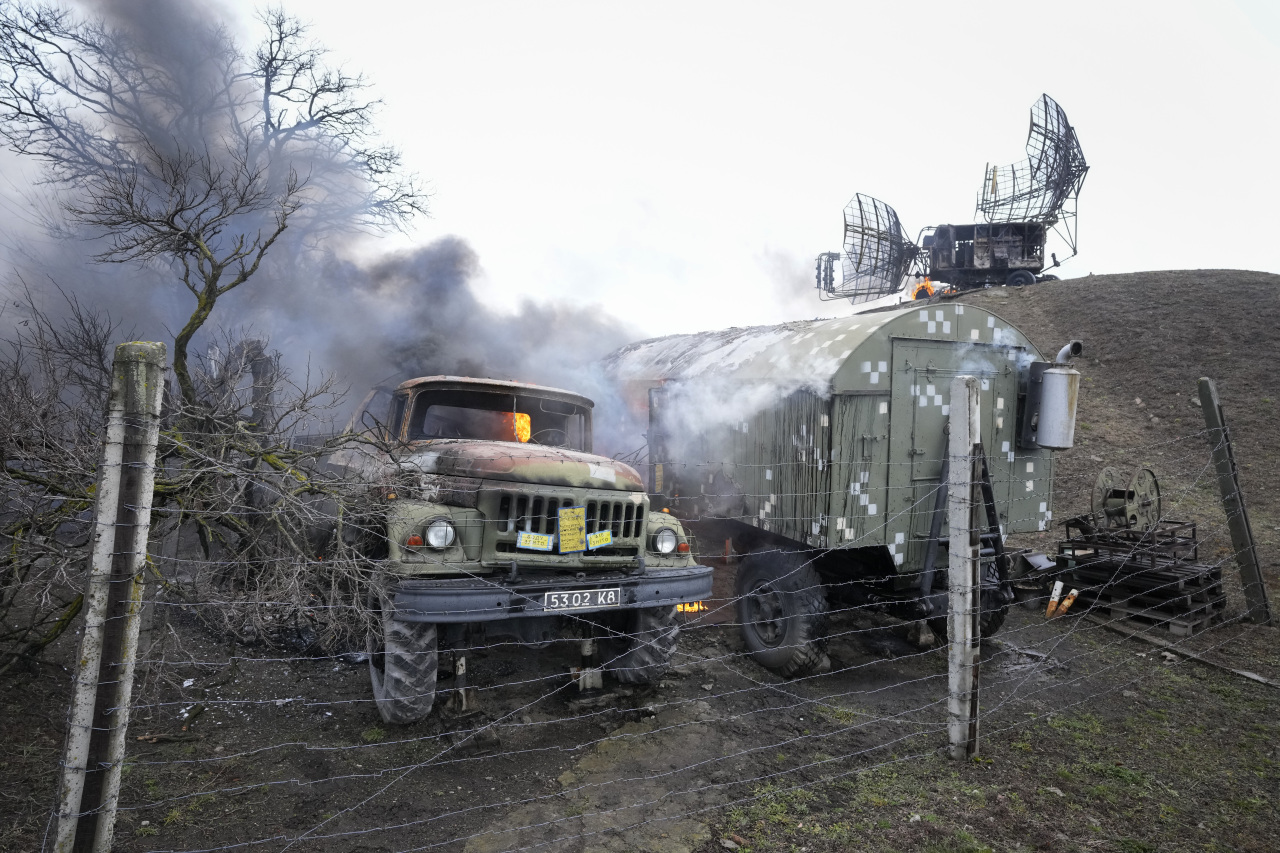 Ukraine military facility is on fire after being damaged by an attack from Russia. (AP-Yonhap)