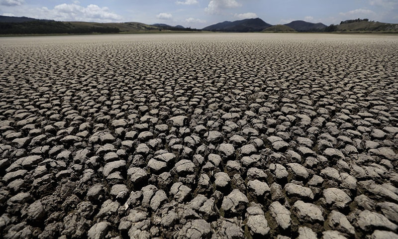 After years of very little rainfall, the lagoon sits dry and cracked in Suesca, Colombia on February 17, 2021. (AP)