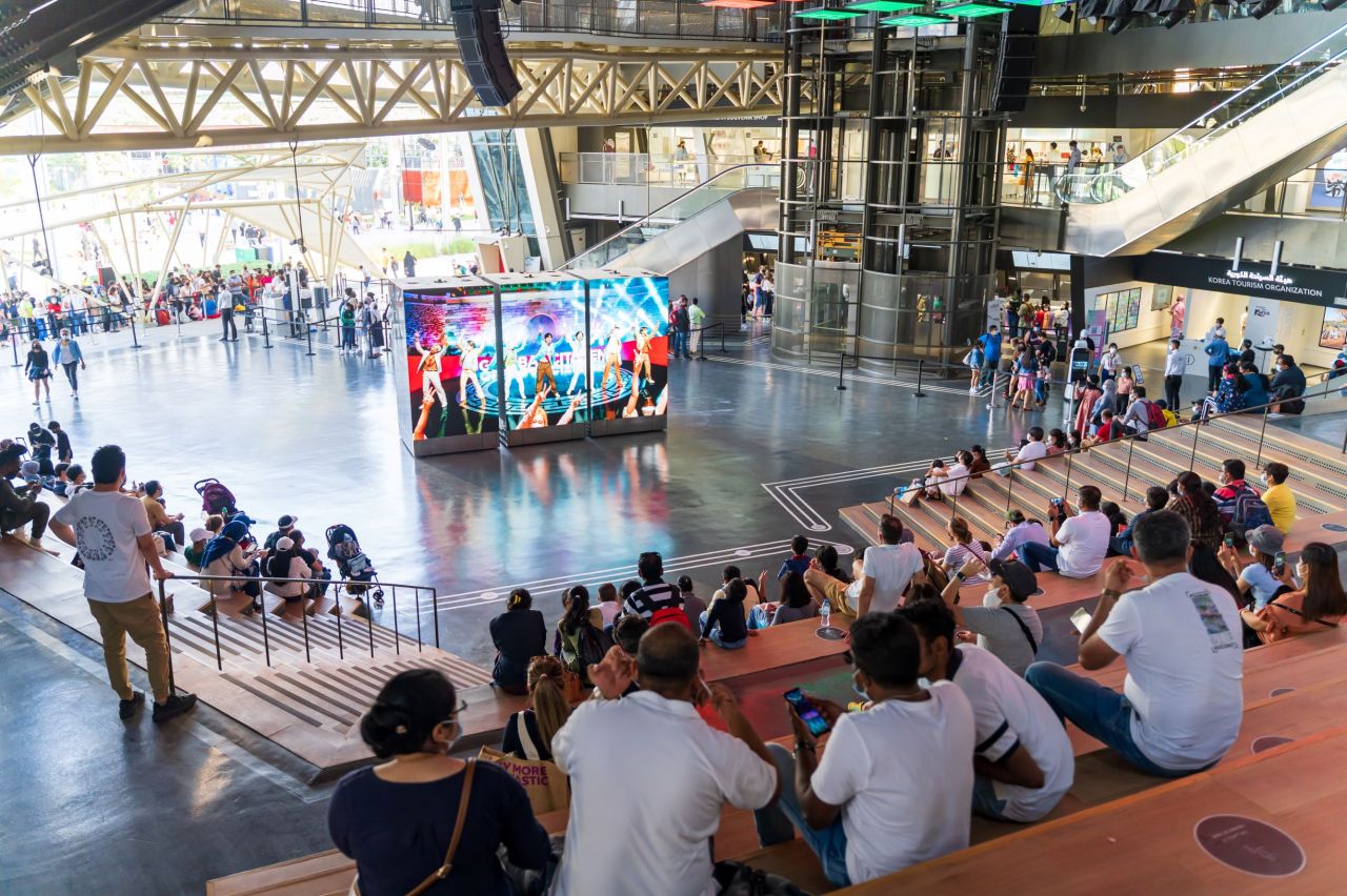 Visitors at the Expo 2020 Dubai’s Korean Pavilion watch music video of BTS’ “Permission to Dance” last year. (Yonhap)