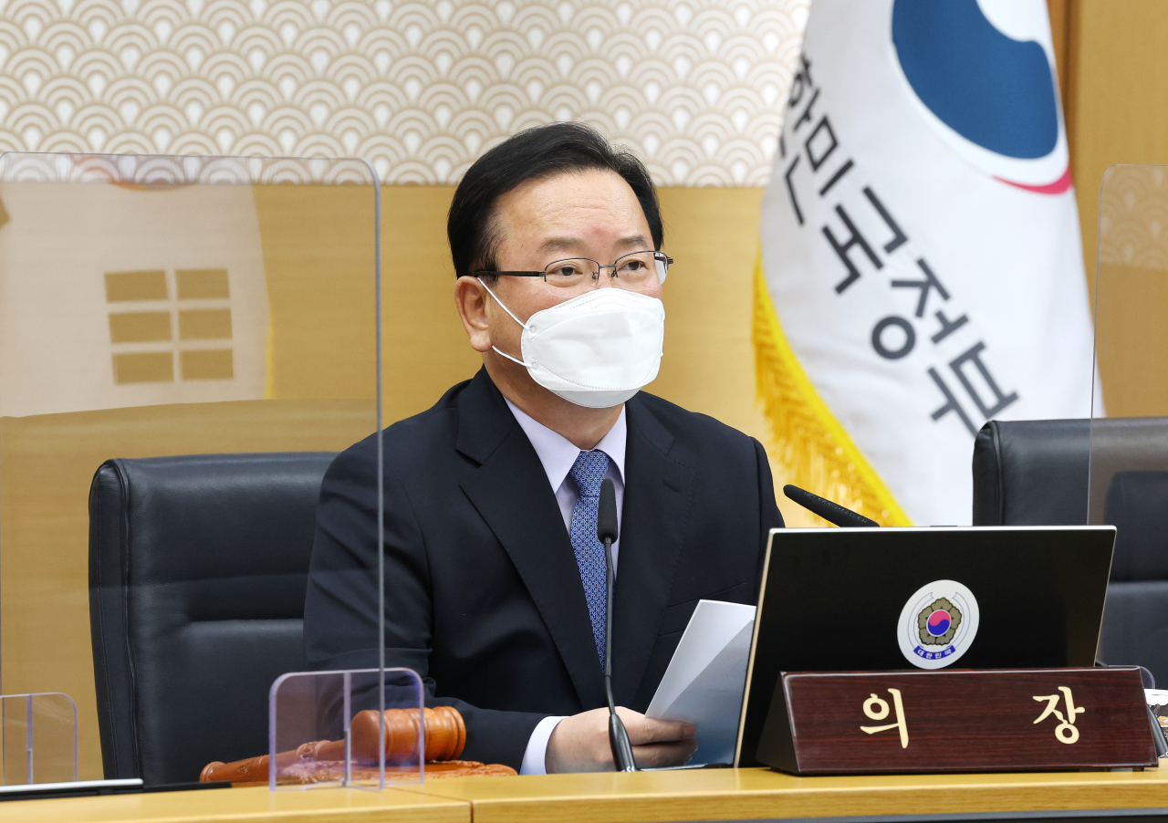 Prime Minister Kim Boo-kyum presides over a Cabinet meeting in Sejong on Tuesday. (Yonhap)