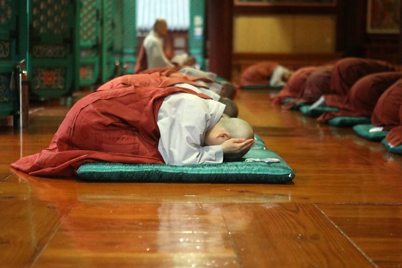 Nuns pray during a daily prayer meeting at the Unmunsa Buddhist Nunnery University. (Hyungwon Kang)