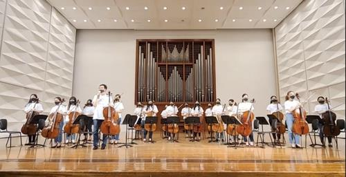 This photo, provided by Bae Il-hwan, a professor at Ewha Womans University College of Music, shows the music volunteer group Ewha Celli. (Yonhap)