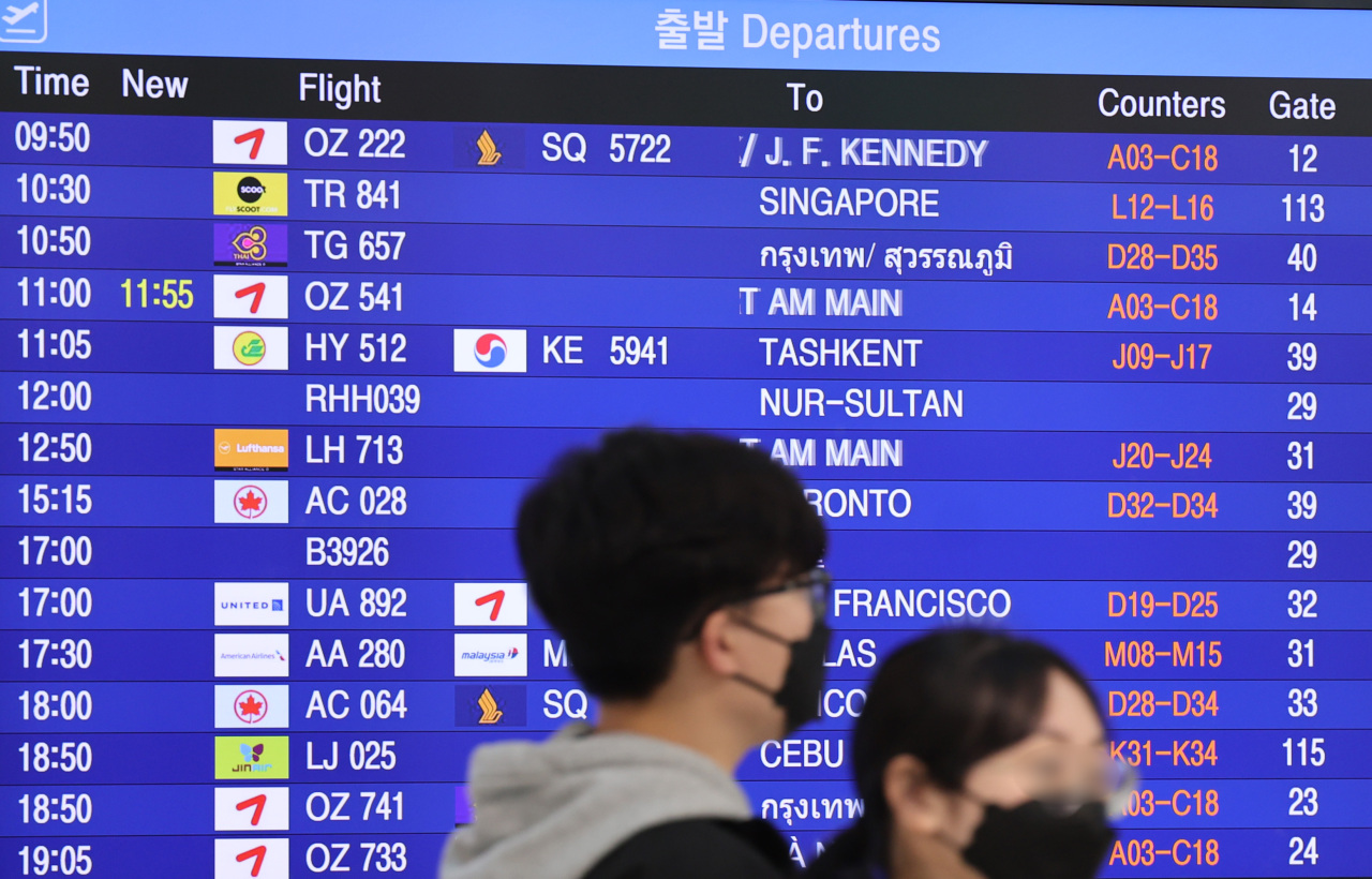 Flight departure times are shown at Terminal 1 of Incheon Airport on Monday. (Yonhap)