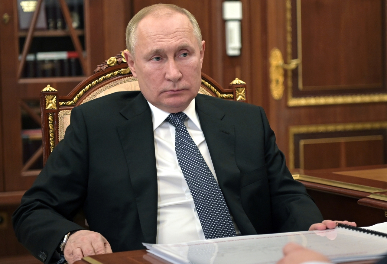 Russian President Vladimir Putin listens during a meeting in Moscow on Tuesday. (AP-Yonhap)