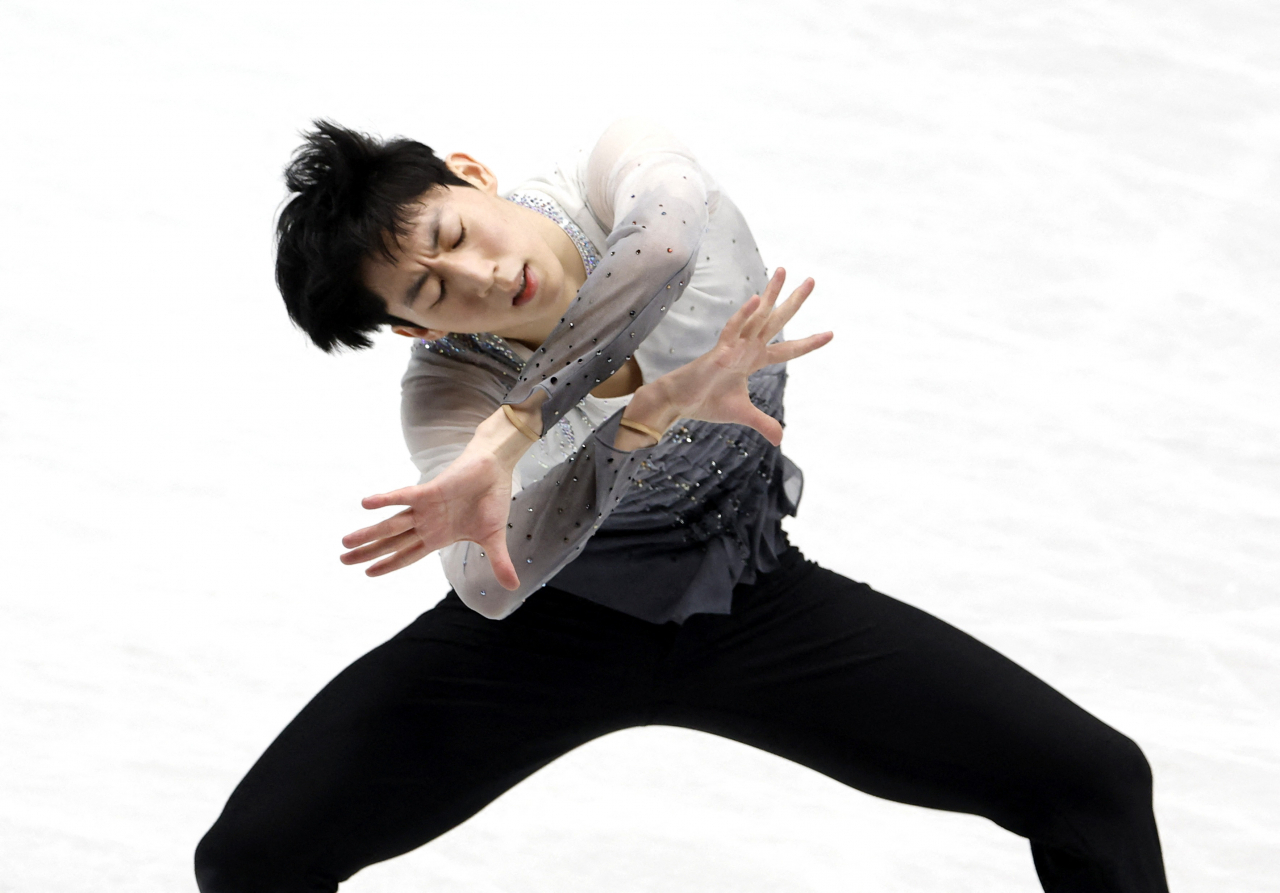 In this EPA photo from last Thursday, Lee Si-hyeong of South Korea performs in the men's short program at the International Skating Union World Figure Skating Championships at Sud de France Arena in Montpellier, France. (Yonhap)