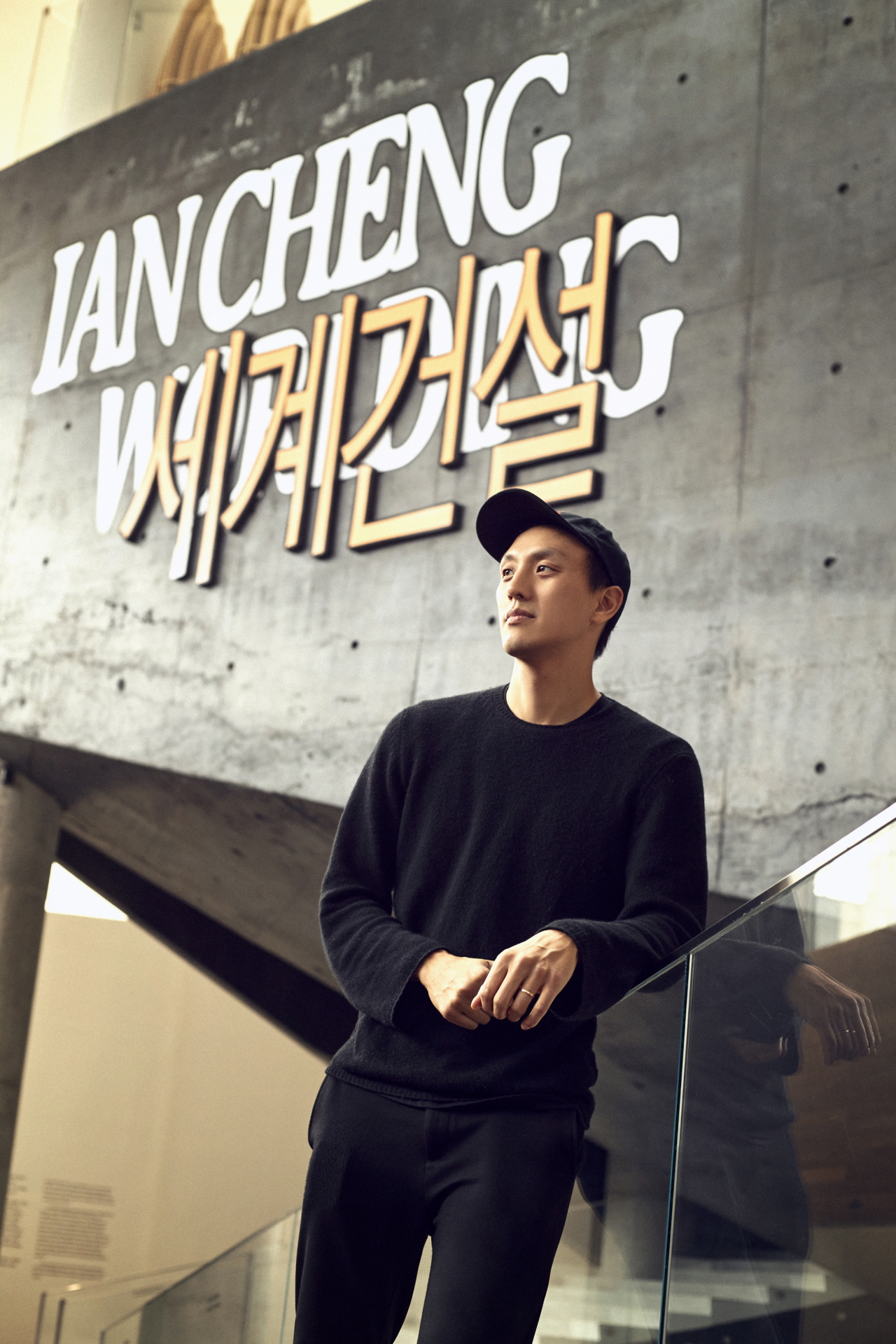 Ian Cheng poses in front of his solo exhibition at Leeum Museum of Art in Seoul. (Leeum Museum of Art)