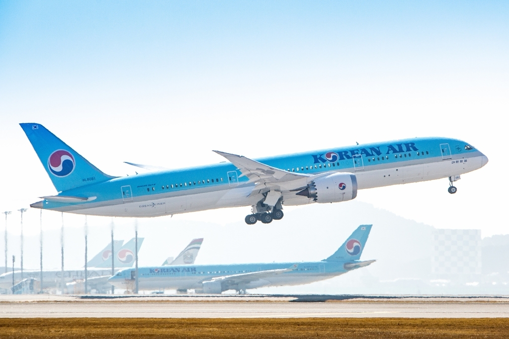 This file photo provided by Korean Air shows a B787-9 passenger jet taking off from Incheon International Airport, west of Seoul. (Korean Air)