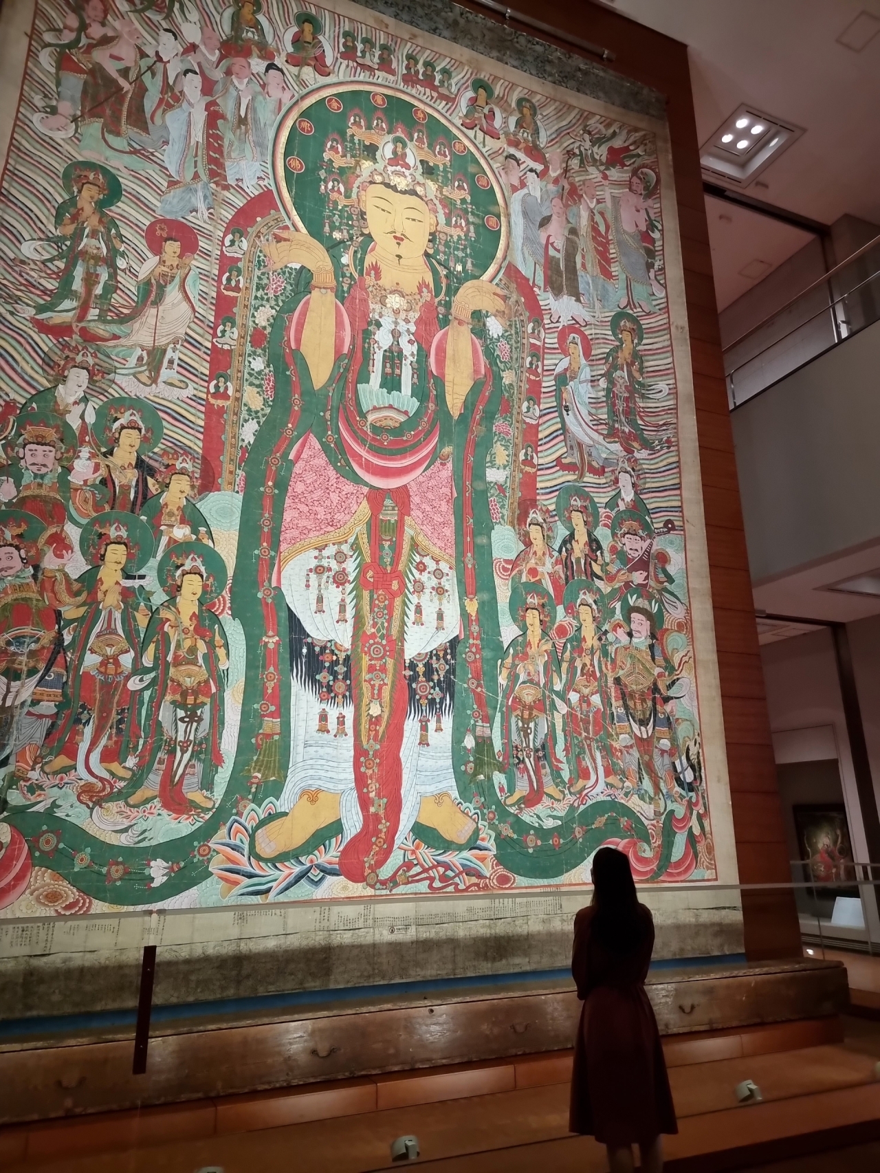 A large-scale banner painting of a Buddha from Sudeoksa in South Chungcheong Province is on display at National Museum of Korea in Yongsan-gu, Seoul. (NMK)