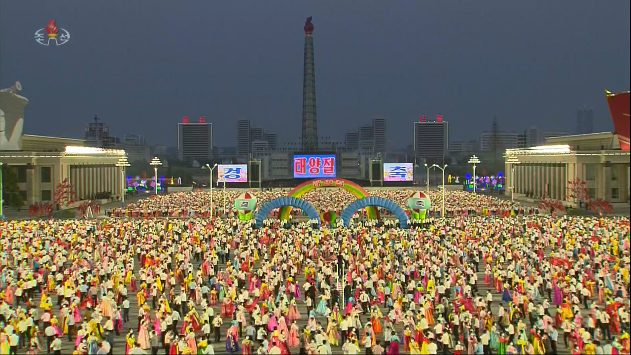 This image from North Korea`s Korean Central Television shows students dancing at Kim Il-sung Square in Pyongyang on April 15, 2022, during an event to celebrate the 110th birth anniversary of late national founder Kim Il-sung.(Yonhap)