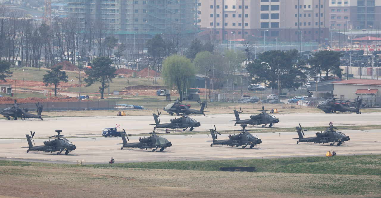 This photo taken on Monday, shows Apache helicopters parked at U.S. military base Camp Humphreys in Pyeongtaek, 70 kilometers south of Seoul. (Yonhap)