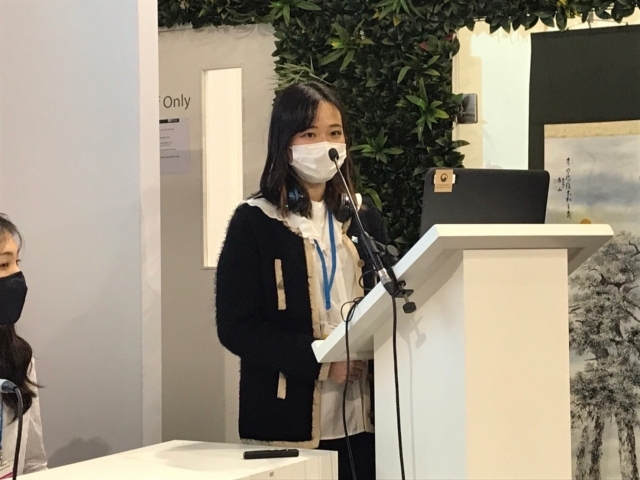 Kohana Yanagisawa, member of Climate Youth Japan, speaks about carbon neutrality at the United Nations Climate Change Conference in Glasgow, Scotland, in November. (Courtesy of Kohana Yanagisawa)