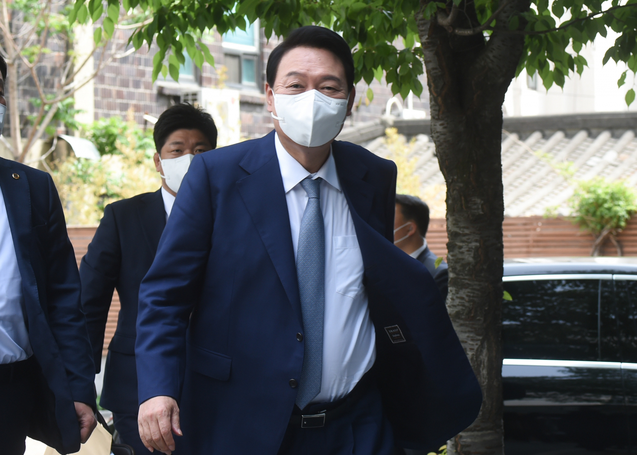 This photo taken on Tuesday, shows President-elect Yoon Suk-yeol heading to his office in Seoul. (Yonhap)