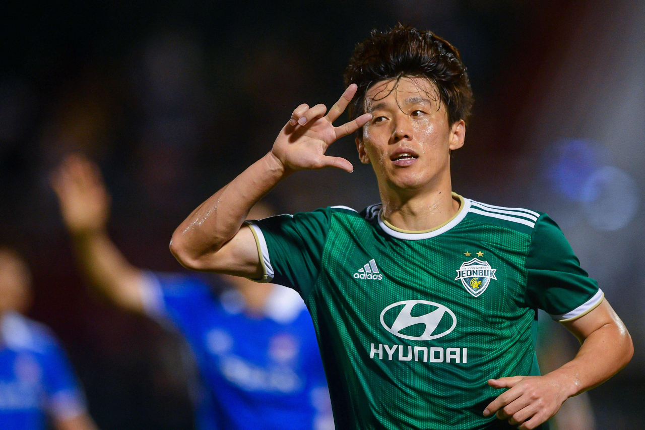 In this photo provided by the Asian Football Confederation (AFC), Kim Bo-kyung of Jeonbuk Hyundai Motors celebrates his goal against Yokohama F. Marinos during the clubs' Group H match at the AFC Champions League at Thong Nhat Stadium in Ho Chi Minh City on Sunday. (AFC)