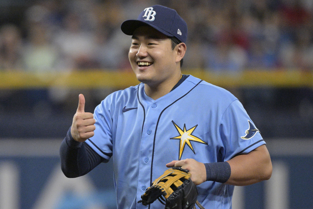 Tampa Bay Rays first baseman Ji-Man Choi reacts after getting a favorable ruling on a reviewed play off a ground ball hit by Boston Red Sox's Alex Verdugo during the fourth inning of a baseball game, Saturday, April 23, 2022, in St. Petersburg, Fla. Vertugo was ruled out upon review as Choi got the throw in time. (AP)