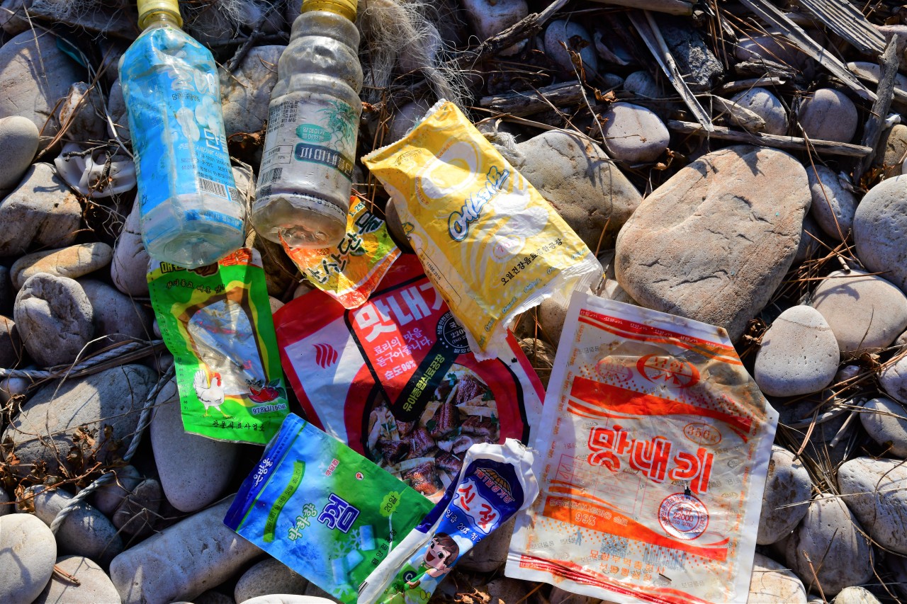 Beverage bottles, wrappers for chewing gum, condiments, ice cream and milk were found on the front-line island in the West Sea. (Photo Credit: Kang Dong-wan)
