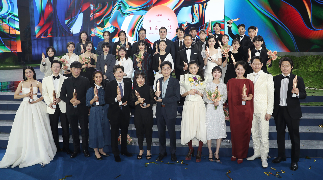 Winners of the 58th Baeksang Arts Awards ceremony pose at the Korea International Exhibition Center in Goyang, just northwest of Seoul, on Friday. (Yonhap)