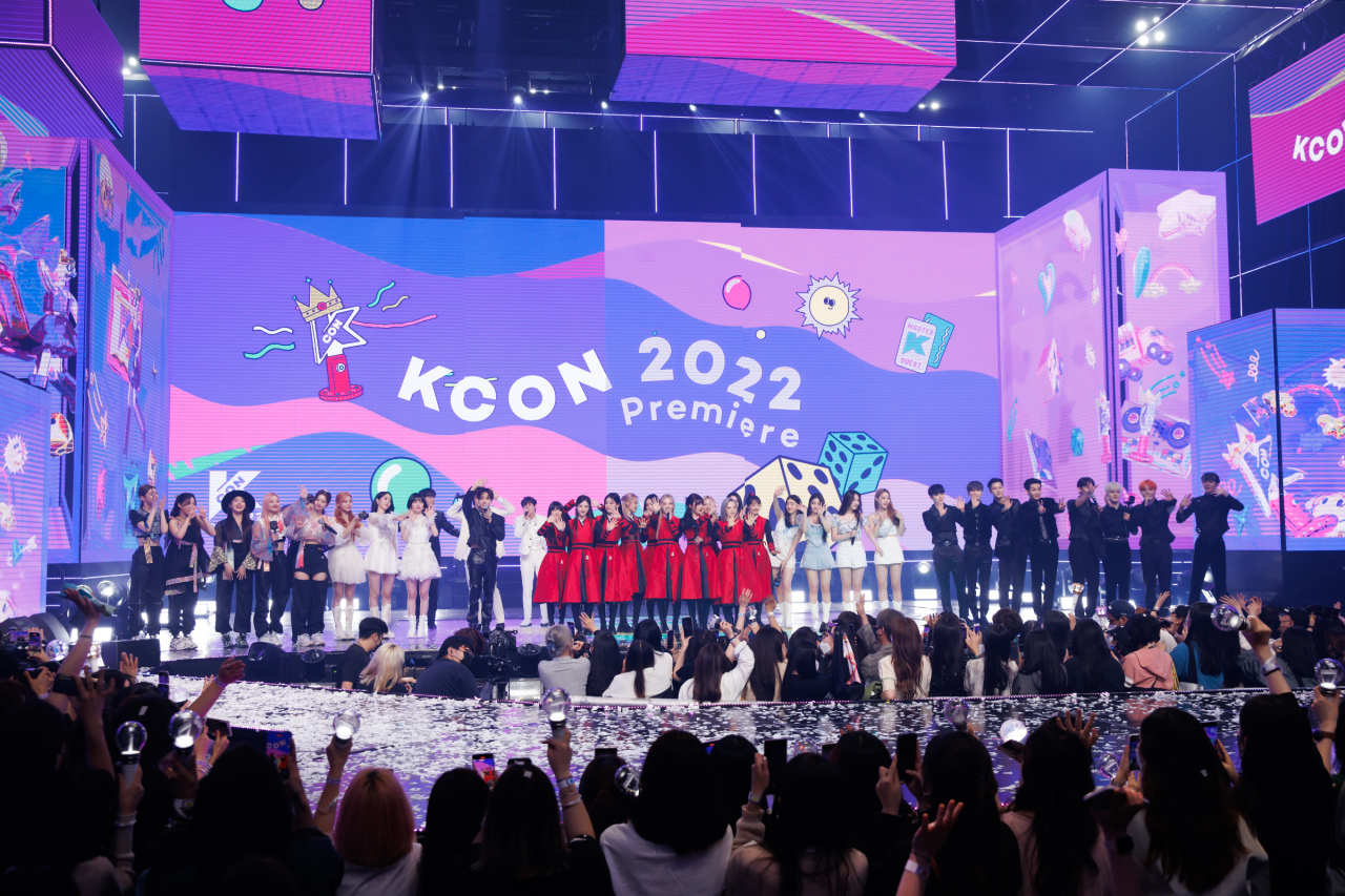 Performers gather on the stage during “KCON 2022 Premiere in Seoul” on Saturday at the CJ ENM Center in Sangam-dong, western Seoul. (CJ ENM)