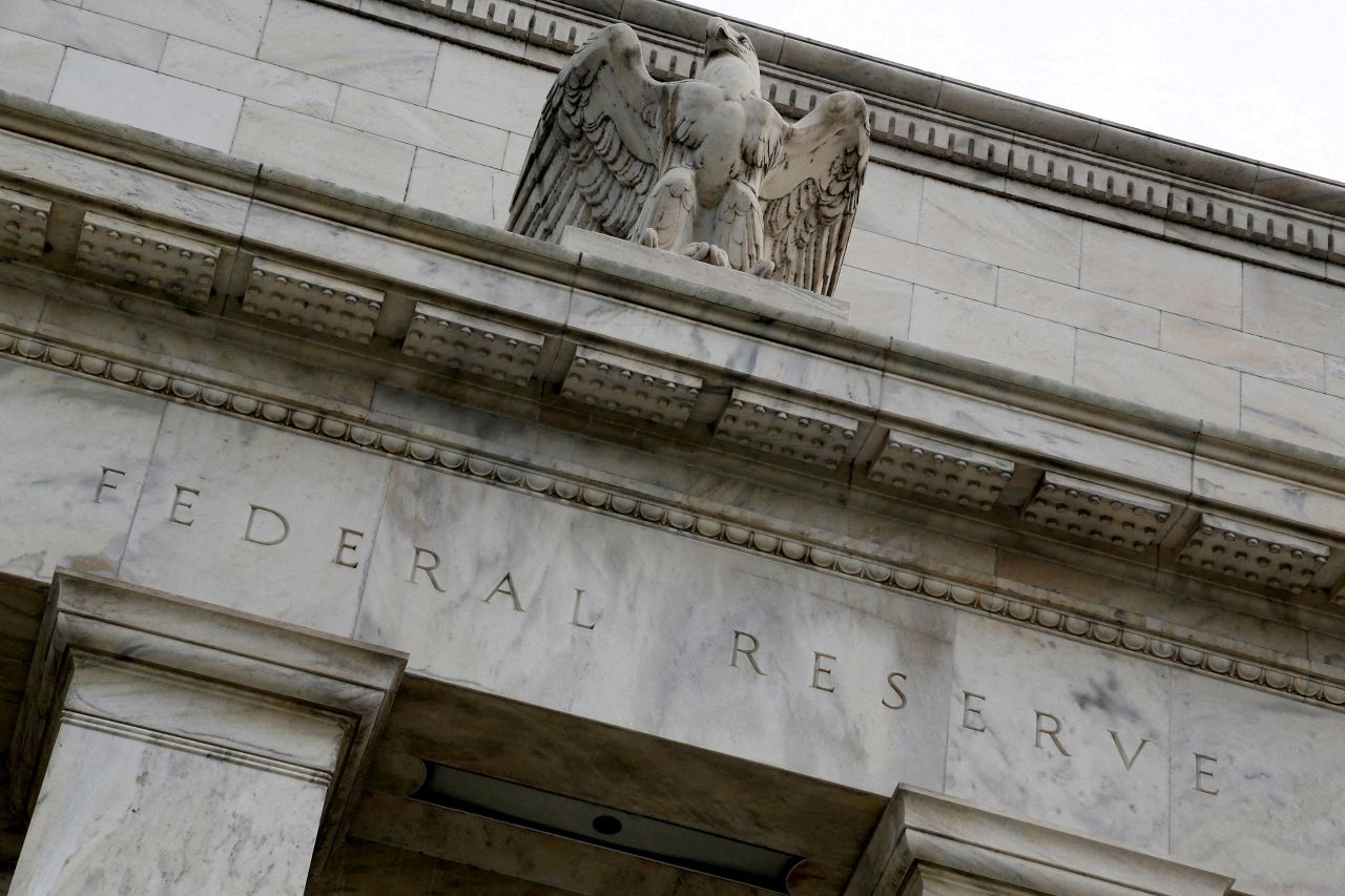 An eagle tops the US Federal Reserve building`s facade in Washington, July 31, 2013. (Reuters)