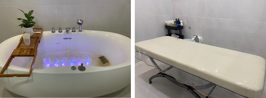 A one-person bathhouse in Suwon furnished with a bathtub filled with warm water and a bed where customers get seshin. (Courtesy of Bae)
