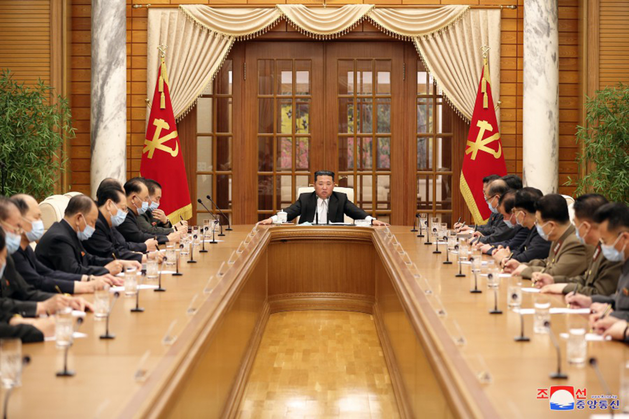 North Korean leader Kim Jong-un (center) presides over a politburo meeting of the Workers’ Party at the headquarters of the party’s Central Committee in Pyongyang, North Korea, Thursday. (Yonhap)