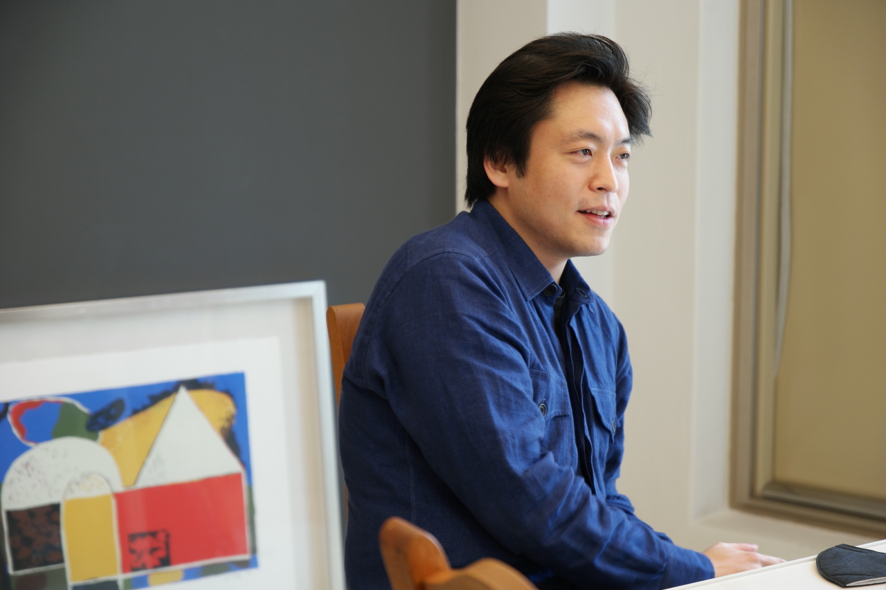 Pianist Kim Sunwook talks during an interview at Vincero Arts Management & Entertainment in eastern Seoul on Thursday. (Vincero)