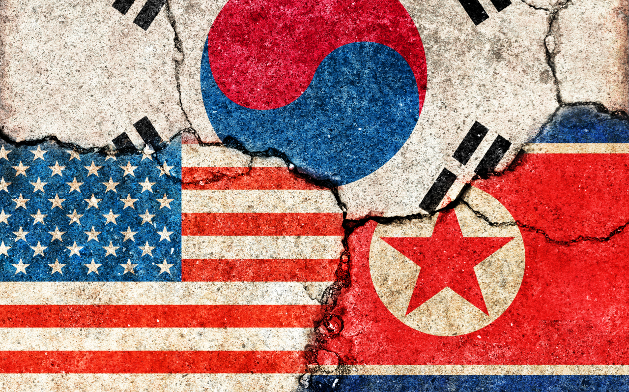 US, South Korean and North Korean flags (from left to right). (123rf)
