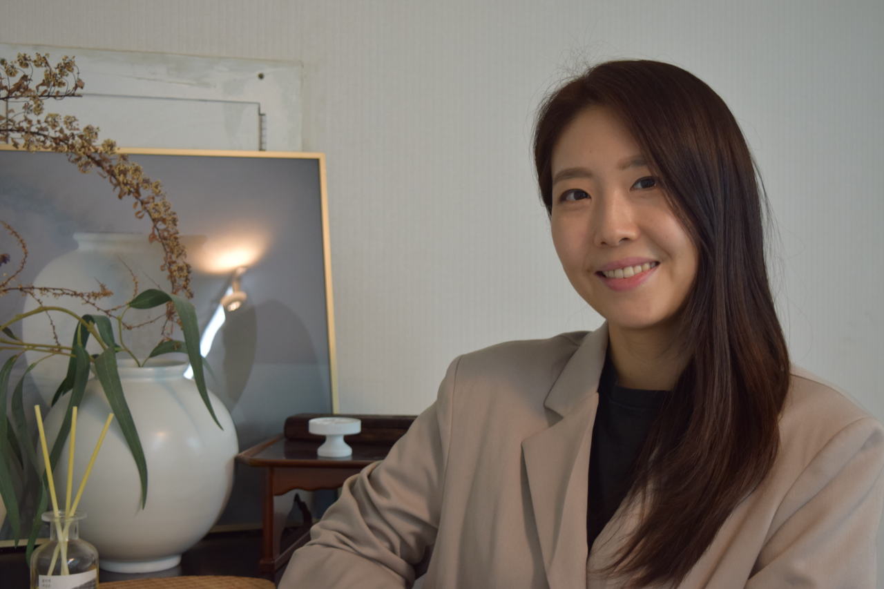 Kim Eun-bi, founder of Middle Studio, poses at her office in Jongno-gu, central Seoul, during an interview with The Korea Herald, May 25. (Kim Hae-yeon/ The Korea Herald)